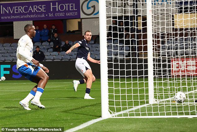 Fink rolls the ball into an empty net after rounding Pandur to open the scoring