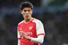 Takehiro Tomiyasu of Arsenal looks on during the Premier League match between Manchester City and Arsenal FC at Etihad Stadium on March 31, 2024 in...