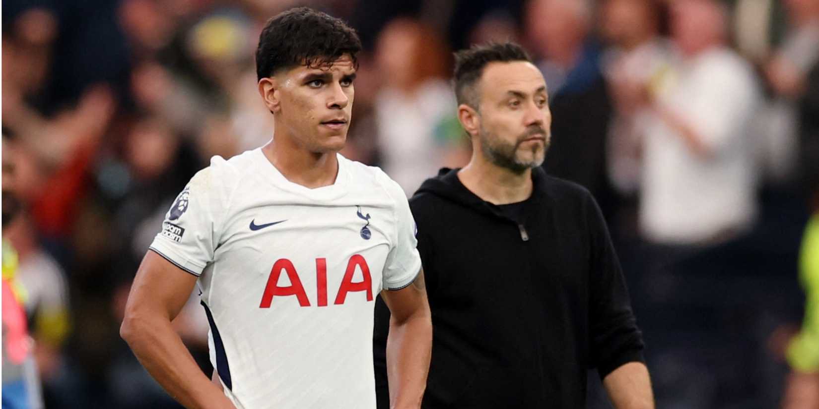 Tottenham Hotspur's Mateus Fernandes and manager Roberto De Zerbi look dejected