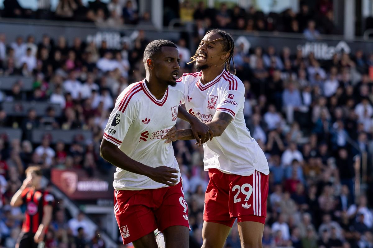 Alexander Isak of Liverpool celebrates with Bradley Barcola of Liverpool after scoring.