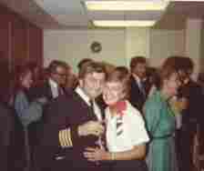 Claire and Captain Moody at a party put on my Lloyd's of London after their ordeal