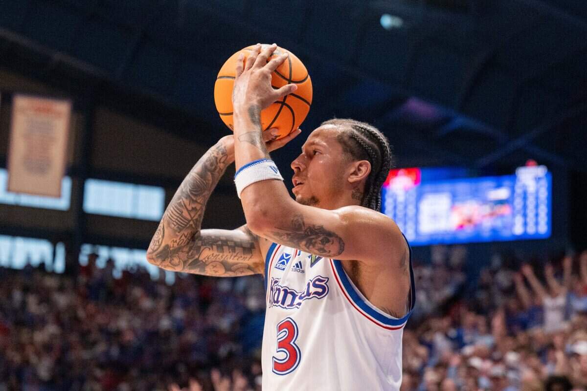 Kansas Jayhawks guard Tre White (3) shoots a 3-pointer in the first half of an exhibition game vs. the Louisville Cardinals on Wednesday, October 21, 2026, at Allen Fieldhouse.