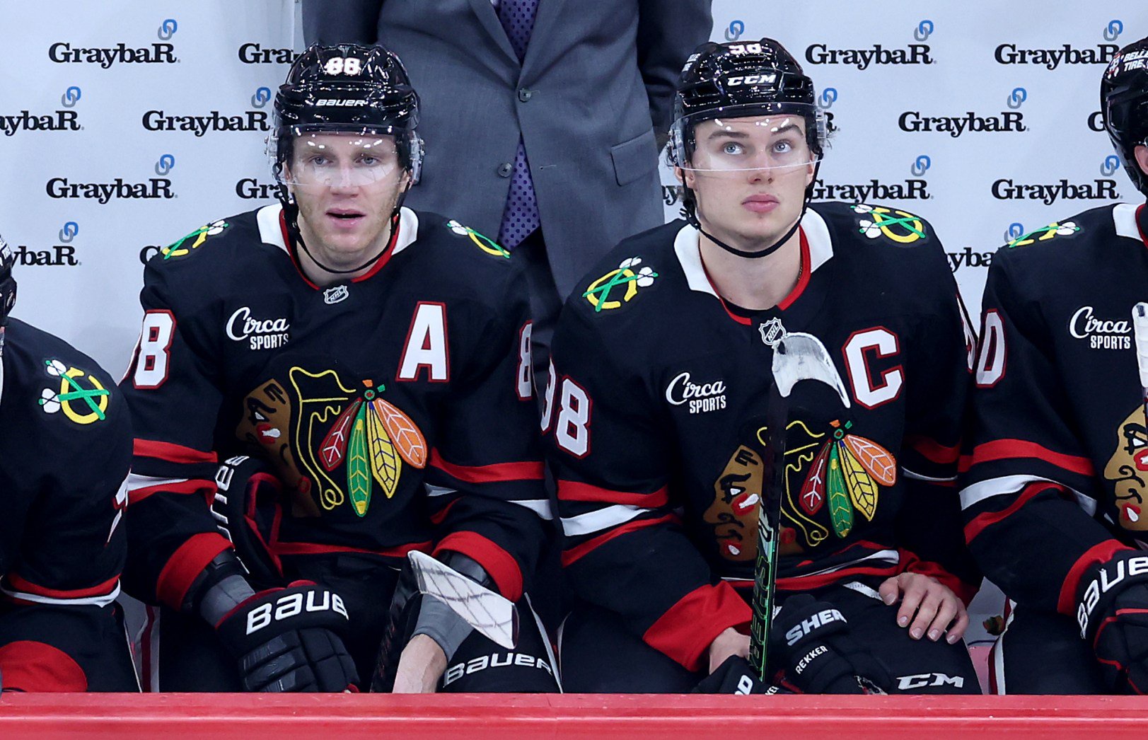 Blackhawks right wing Patrick Kane, left, and center Connor Bedard sit on the bench in the second period against the Canadiens on Friday, Oct. 23, 2026, at the United Center. (Chris Sweda/Chicago Tribune)