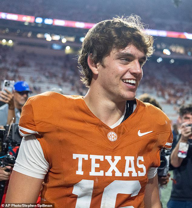 Texas quarterback Arch Manning (16) celebrates a win against Mississippi in Athens