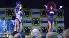 Rob Keetch Two drag queens in purple on a stage