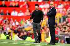 Mikel Arteta, Manager of Arsenal and Erik ten Hag, Manager of Manchester United look on during the Premier League match between Manchester United a...