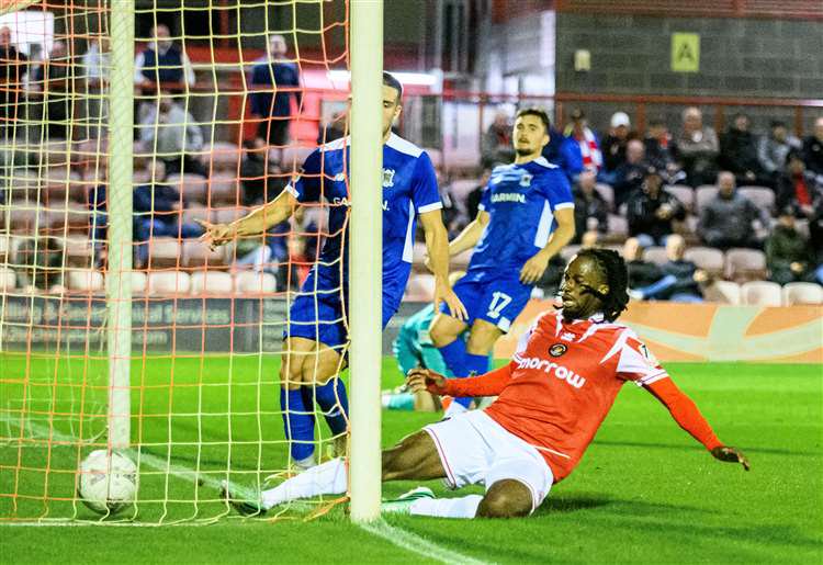 Daniel Ogunleye slides in to score Ebbsfleet's third goal against AFC Totton. Picture: Ed Miller/EUFC