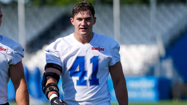 Roy Lopez #51 and Jimmy Rolder #41 of the Detroit Lions walk together during Detroit Lions Training Camp at Detroit Lions Meijer Performance Center on July 29, 2026 in Allen Park, Michigan.