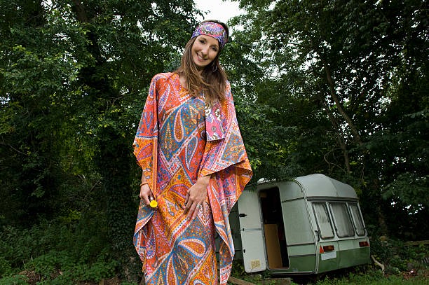 hippy female by caravan - women kaftan stock pictures, royalty-free photos & images