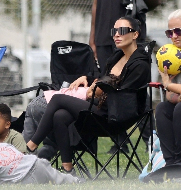 Kim Kardashian sits and watches her son Saint's soccer game