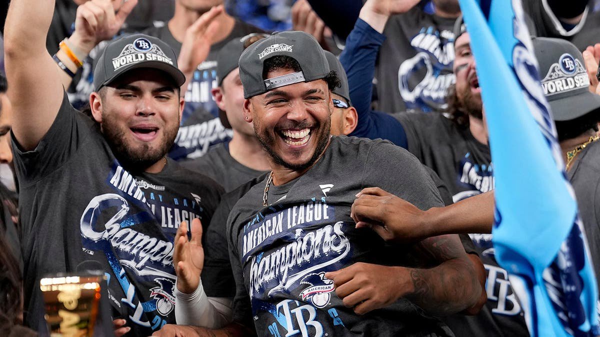 Freddy Peralta celebrates after the Rays' win against the Guardians.