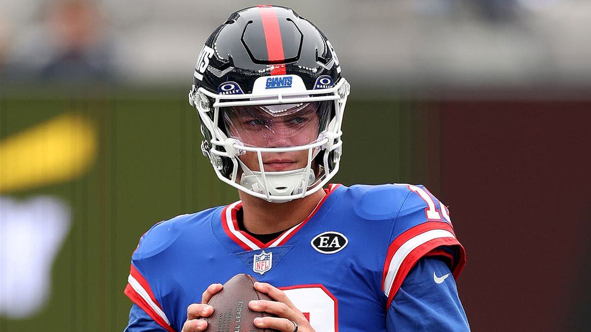 J.J. McCarthy warms up before a game at MetLife Stadium.