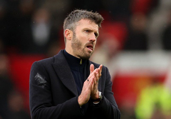 Soccer Football - Premier League - Manchester United v AFC Bournemouth - Old Trafford, Manchester, Britain - October 25, 2026 Manchester United manager Michael Carrick looks dejected as he applauds fans after the match REUTERS/Chris Radburn EDITORIAL USE ONLY. NO USE WITH UNAUTHORIZED AUDIO, VIDEO, DATA, FIXTURE LISTS, CLUB/LEAGUE LOGOS OR 'LIVE' SERVICES. ONLINE IN-MATCH USE LIMITED TO 120 IMAGES, NO VIDEO EMULATION. NO USE IN BETTING, GAMES OR SINGLE CLUB/LEAGUE/PLAYER PUBLICATIONS. PLEASE CONTACT YOUR ACCOUNT REPRESENTATIVE FOR FURTHER DETAILS..