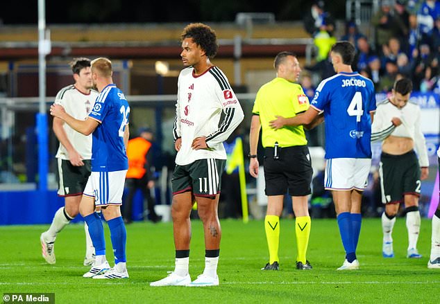 Joshua Zirkzee looks dejected at the final whistle (Luca Rossini/PA)
