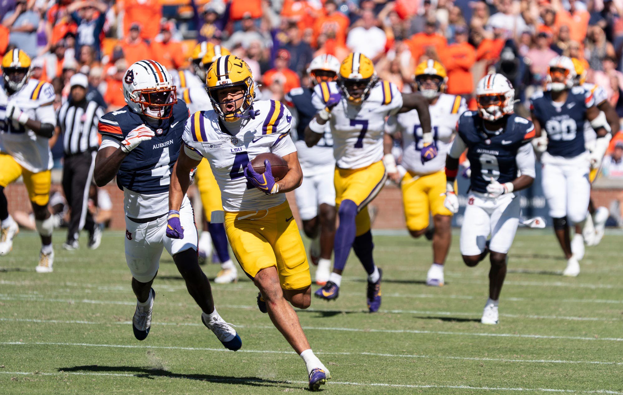 LSU Tigers wide receiver Jackson Harris (4) breaks free after a catch for a touchdown as Auburn Tigers take on LSU Tigers at Jordan-Hare Stadium in Auburn, Ala. on Saturday, Oct. 24, 2026. LSU Tigers defeated Auburn Tigers 38-17.