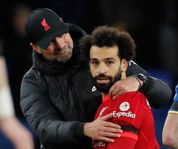 Liverpool manager Juergen Klopp celebrates with Mohamed Salah after the match