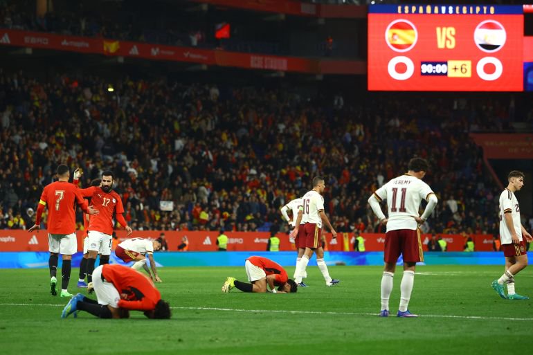 Egypt players react after Spain match