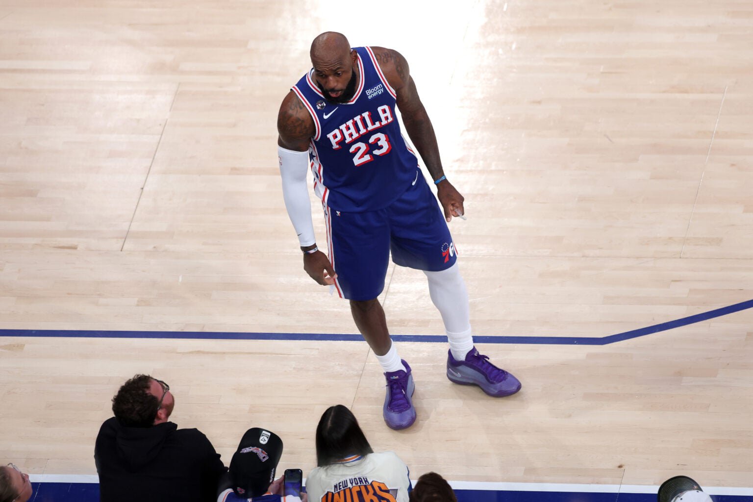 LeBron James #23 of the Philadelphia 76ers speaks with fans in the crowd during the second quarter of the game against the New York Knicks at Madison Square Garden.