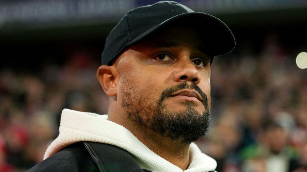 Vincent Kompany watches on during Bayern Munich's Champions League match against Arsenal