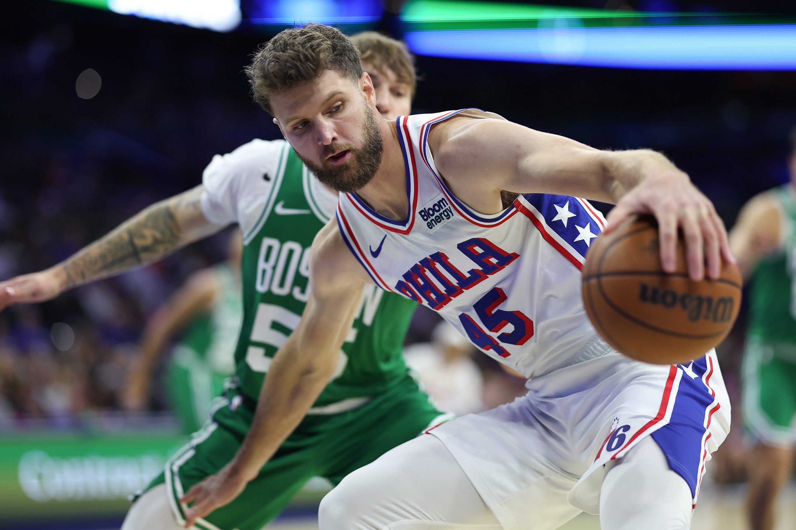 Oct 16, 2026; Philadelphia, Pennsylvania, USA; Philadelphia 76ers forward Dean Wade (45) drives against the Boston Celtics at Xfinity Mobile Arena. Mandatory Credit: Bill Streicher-Imagn Images