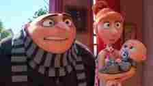 PHOTO: Gru, voiced by Steve Carell, left, and Lucy, voiced by Kristen Wiig, holding Gru Jr. in a scene from "Despicable Me 4."