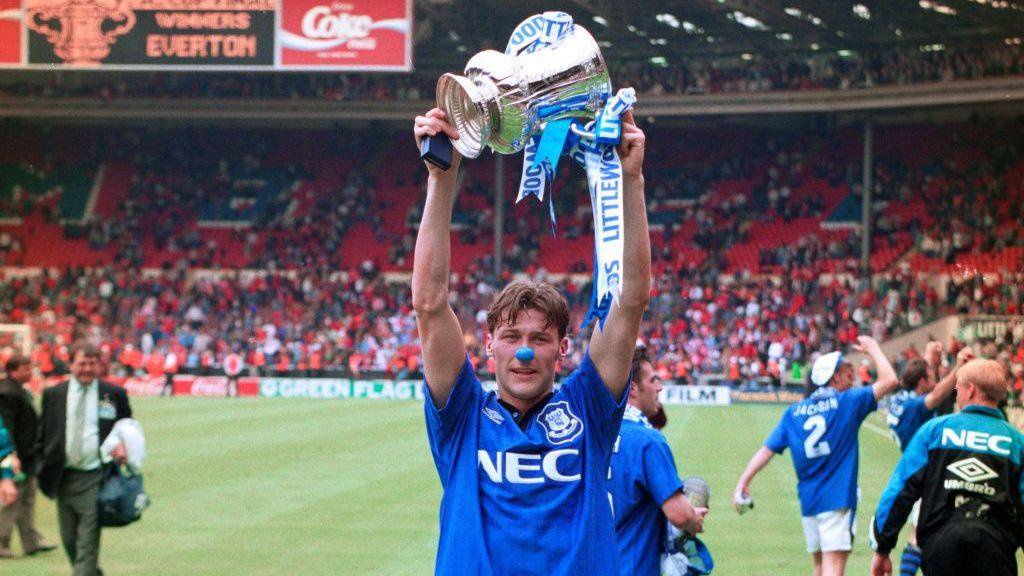 Duncan Ferguson lifts the FA Cup at Wembley