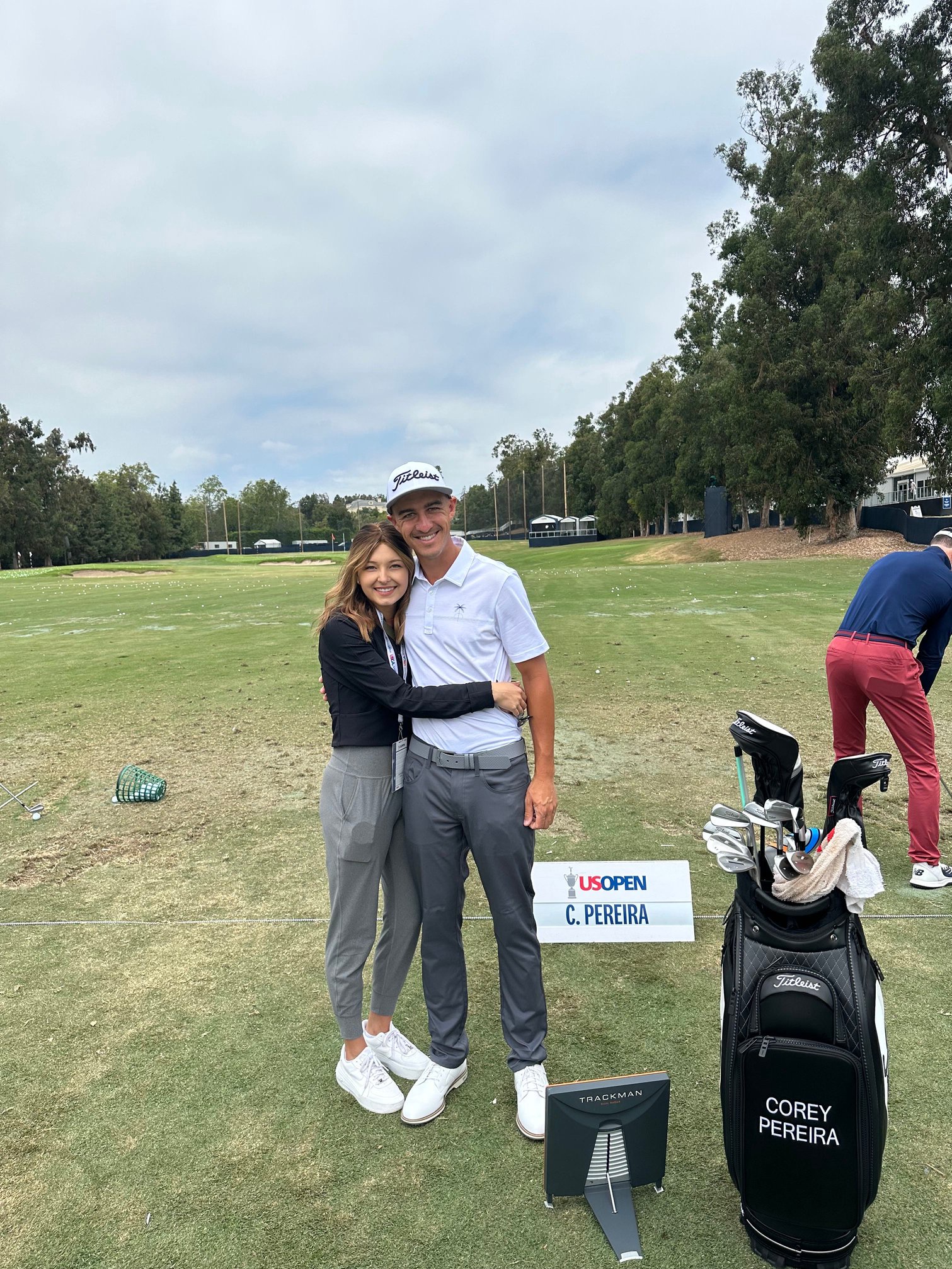 Corey Pereira and wife, Leah, who died of a rare form of cancer at age 28, pose on the range at Los Angeles CC during the 2023 U.S. Open.