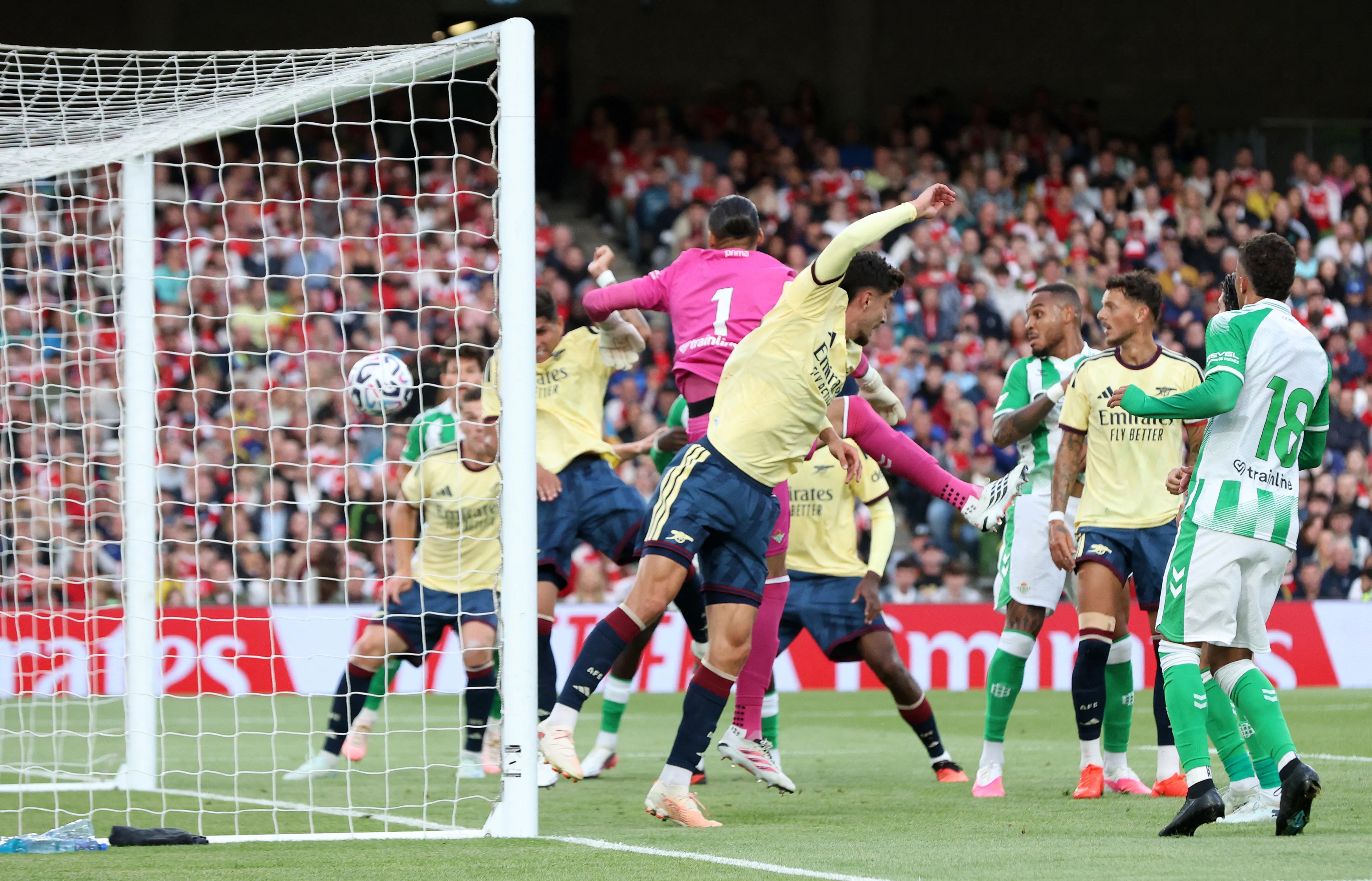Arsenal's Piero Hincapie scores a goal past Real Betis' goalkeeper Alvaro Valles during a friendly match.