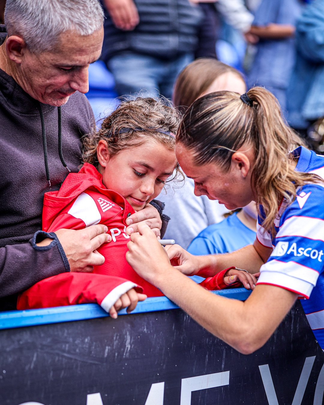 Players signing memorabilia is a post match tradition at Reading FC Women. Photo: Sinead Thompson.