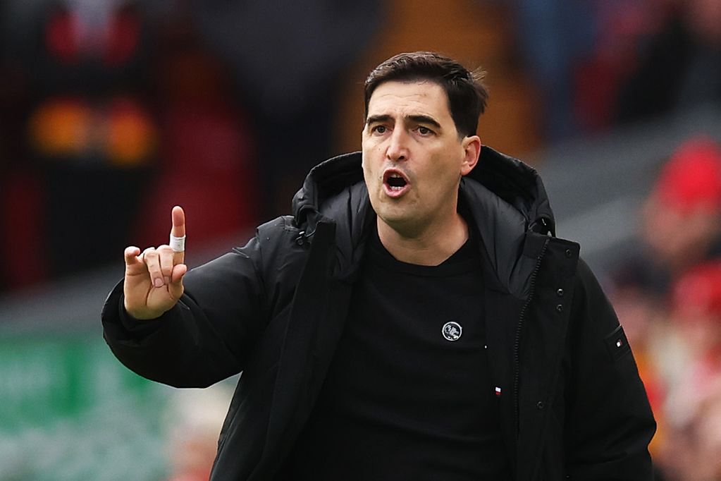 Liverpool head coach Andoni Iraola on the touchline at Anfield.