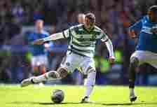 Celtic player Adam Idah shoots to score the third Celtic goal during the Cinch Scottish Premiership match between Rangers FC and Celtic FC at Ibrox...