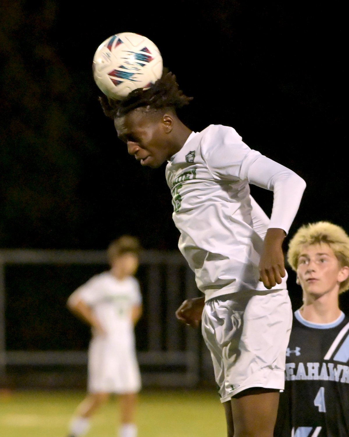 Arundel Wildcats Oluwatise Ishola #15 hits a header during the first half. The visiting Arundel Wildcats defeat the South River Seahawks, 2-1, in overtime in an MPSSAA Class 3A East II quarterfinal boys soccer game Wednesday evening. (Paul W. Gillespie/Staff)