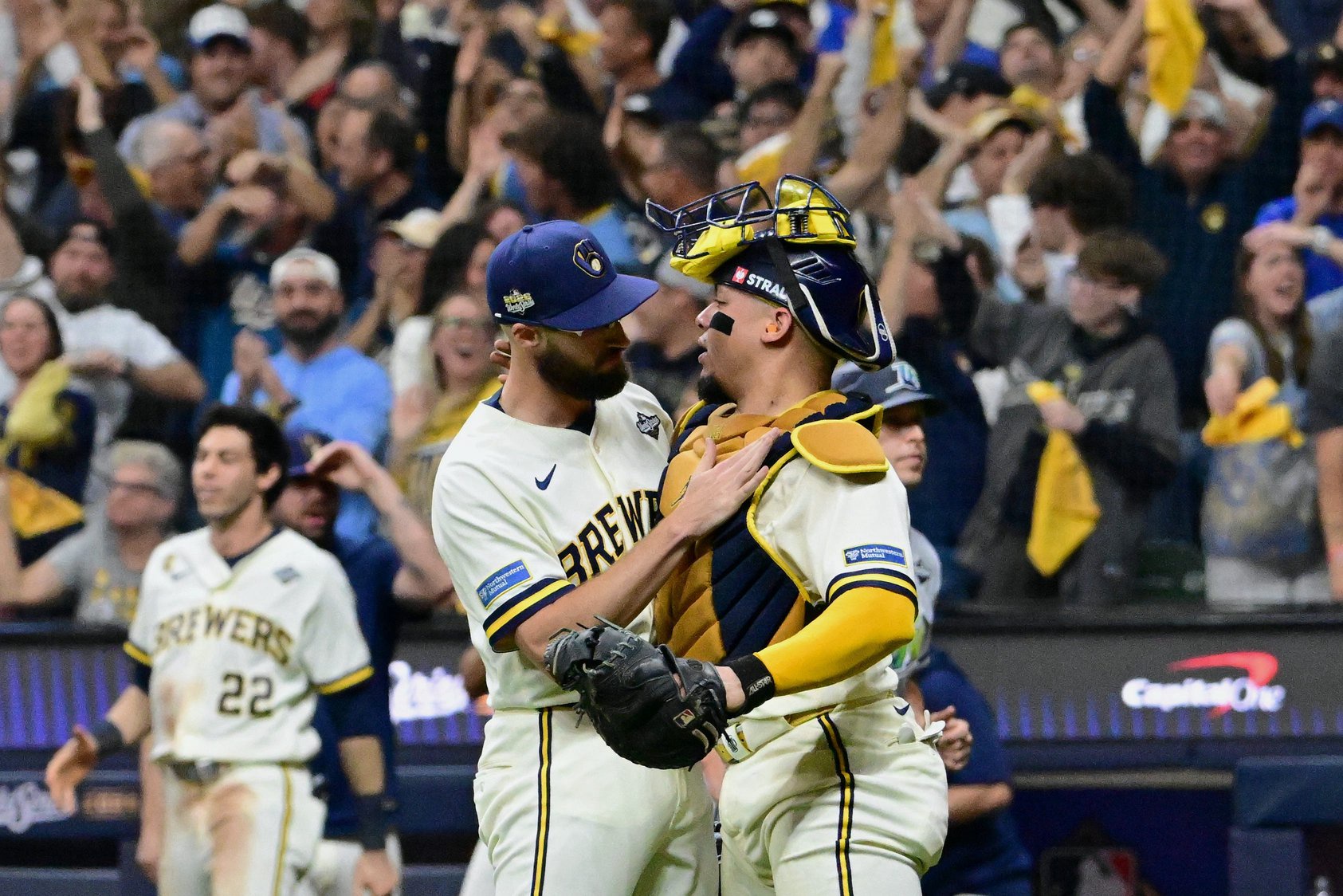 Aaron Ashby and William Contreras celebrate the final out in Game 2.