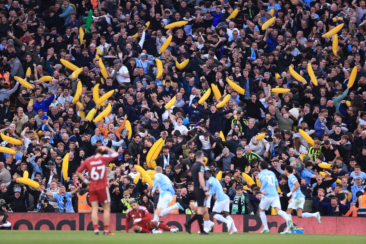 Manchester City fans celebrate Erling Haaland's goal with inflatable bananas during the Premier League 2026/27 match between Liverpool FC and Manchester City