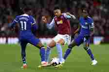Morgan Rogers of Villa battles with Noni Madueke of Chelsea in action during the Premier League match between Aston Villa and Chelsea FC at Villa P...