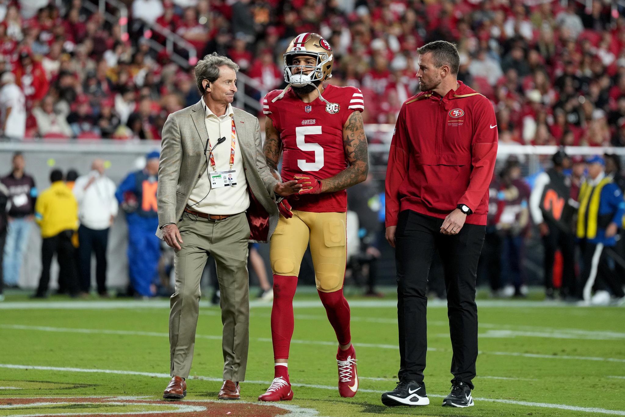 San Francisco 49ers player Mike Evans walks off the field after a play against the Washington Commanders during the second quarter of an NFL football game at Levi's Stadium in Santa Clara, Calif., Monday, Oct. 19, 2026.
