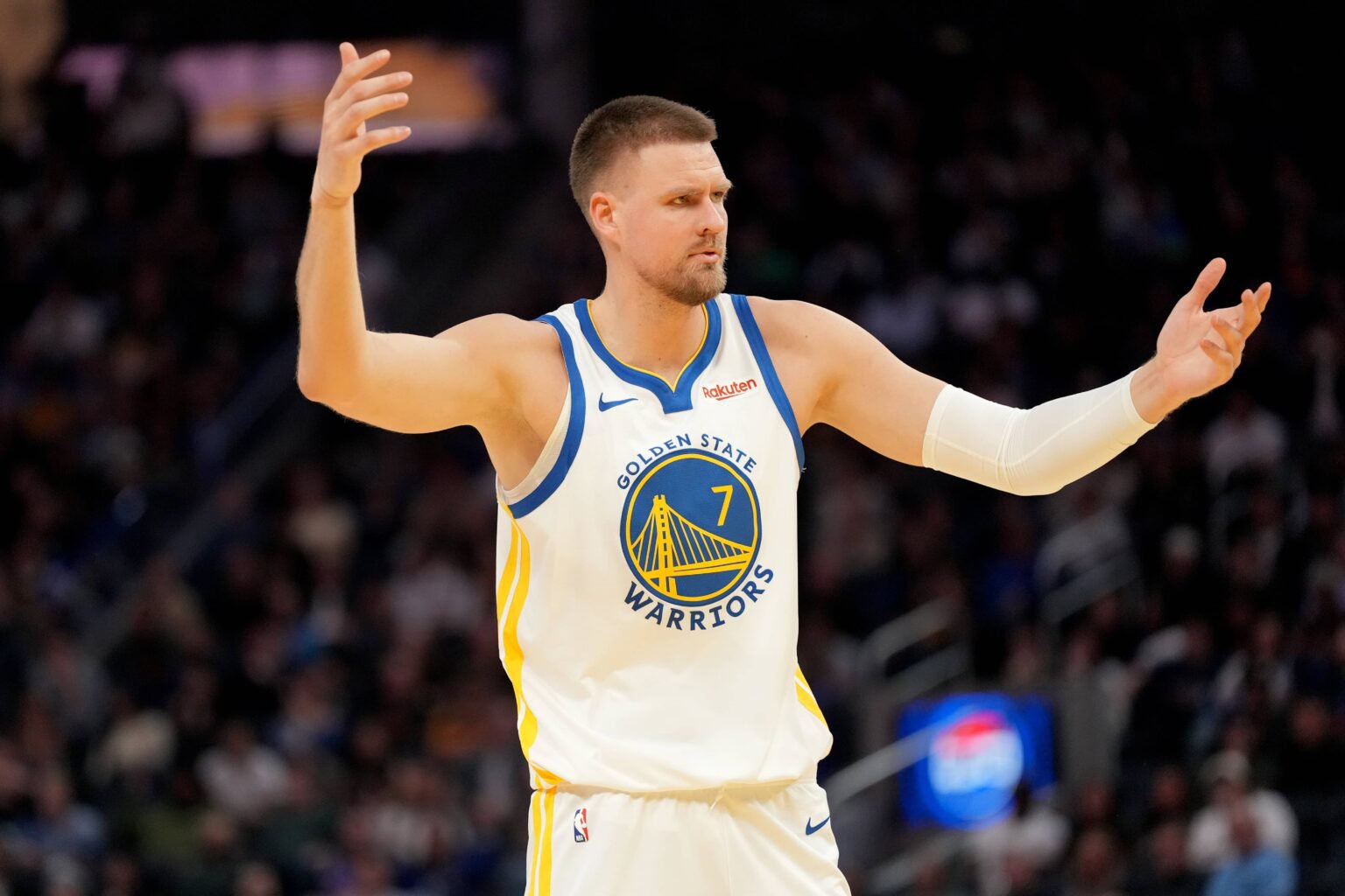 San Francisco, California, USA; Golden State Warriors forward Kristaps Porzingis (7) reacts after being fouled against the Minnesota Timberwolves in the fourth quarter at the Chase Center. Mandatory Credit: Cary Edmondson-Imagn Images