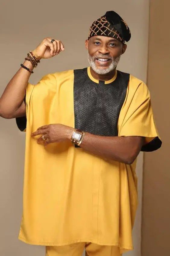 RMD in an African traditional outfit with fila