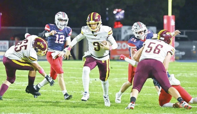 <p>Wyoming Valley West quarterback Damien Eastman (9) finds a large hole to scamper through for a sizeable gain against Pittston Area.</p>
                                 <p>Tony Callaio | For Times Leader</p>