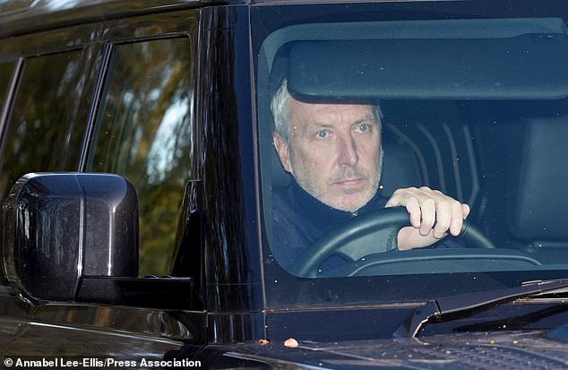 Director of football Jason Wilcox drives into Carrington today after spending Monday discussing Carrick's future