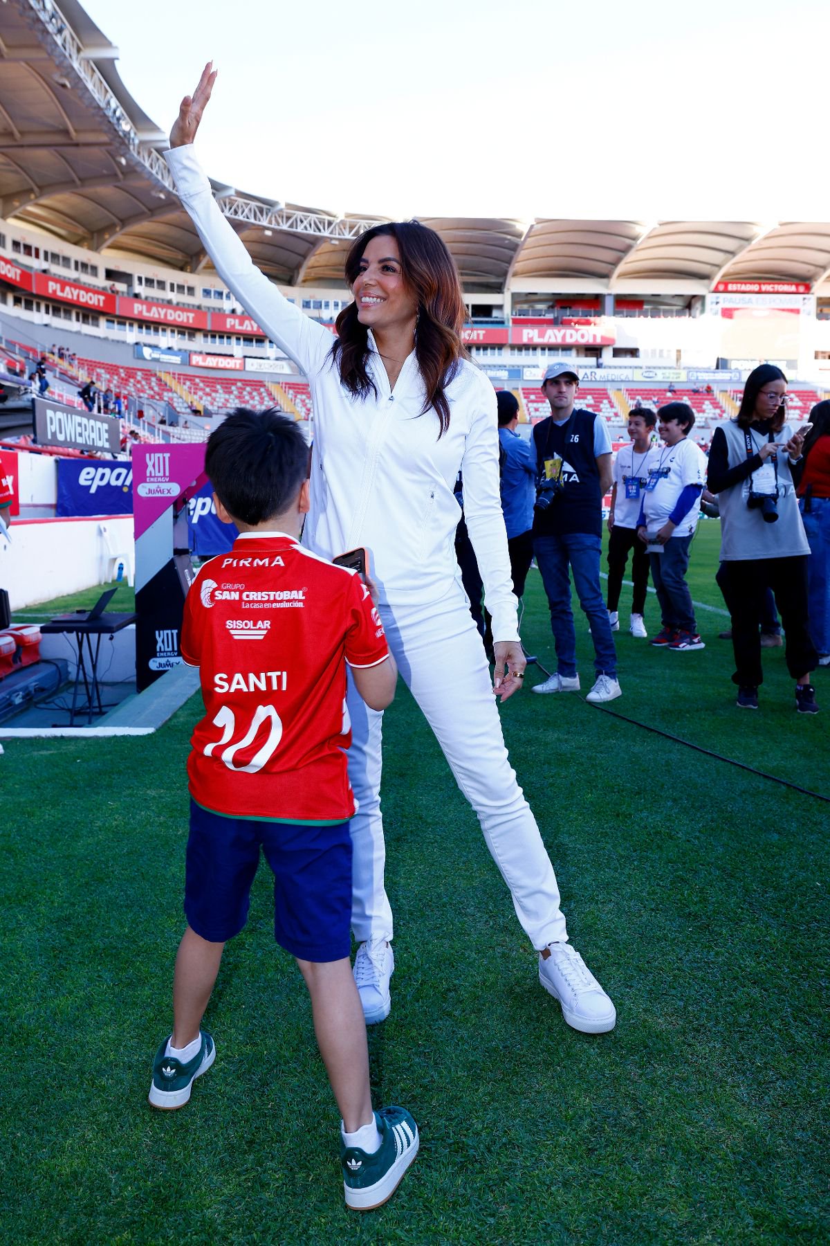 Eva Longoria shareholder of the Necaxa club and her son Santi attend the 13th round match between Necaxa and Queretaro as part of the Torneo Clausura 2025 Liga MX at Victoria Stadium on March 28, 2025 in Aguascalientes, Mexico.