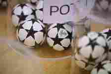 A general view of the draw balls on the pots ahead of the UEFA Champions League 2022/23 Play-offs Round Draw at the UEFA headquarters, The House of...