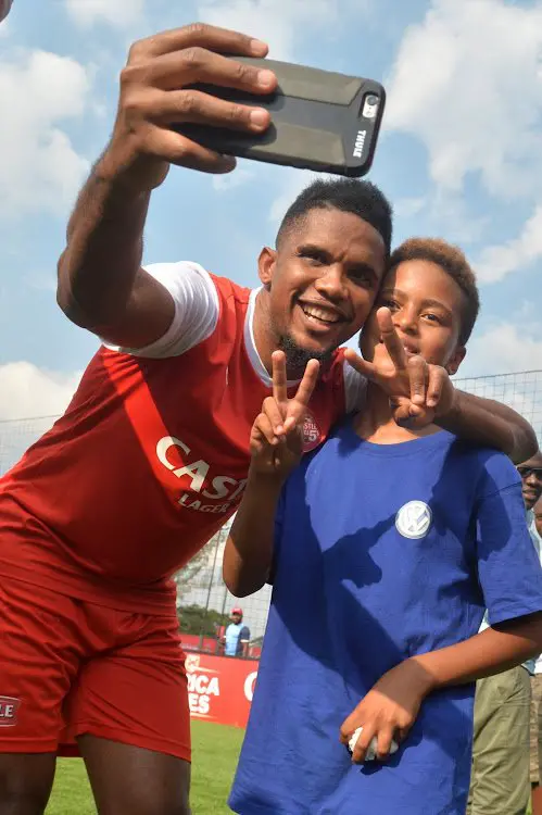 Cameroonian Samuel Eto'o with football legend Mark Haskins' son Mikael Haskins at the Castle Africa 5s Media Launch at Discovery Soccer Park in Johannesburg on January 11 2018.