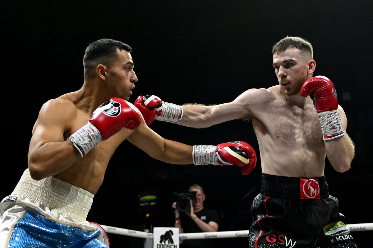 Kieran Molloy in action against Xavier Kohlen