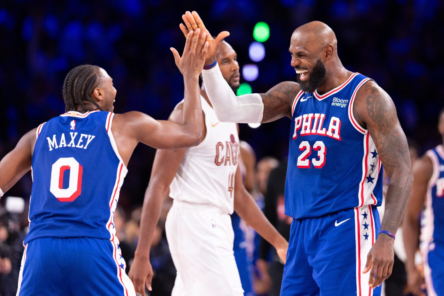 Oct 22, 2026; Philadelphia, Pennsylvania, USA; Philadelphia 76ers forward LeBron James (23) and Tyrese Maxey celebrate after a score against the Cleveland Cavaliers during the fourth quarter at Xfinity Mobile Arena. Mandatory Credit: Bill Streicher-Imagn Images