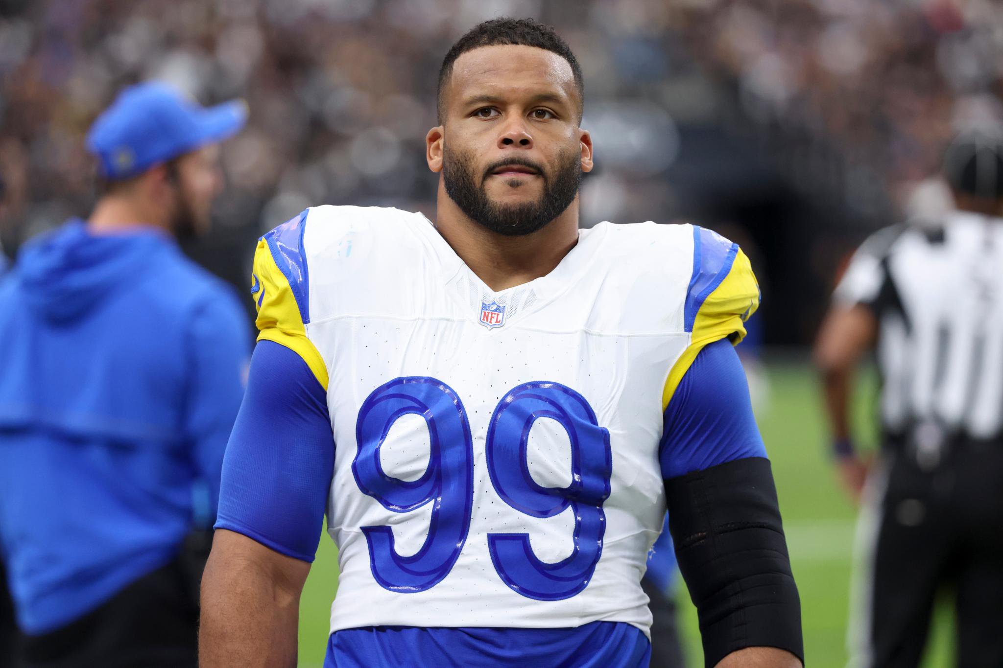 Los Angeles Rams defensive lineman Aaron Donald stands on the field during a game against the Las Vegas Raiders.