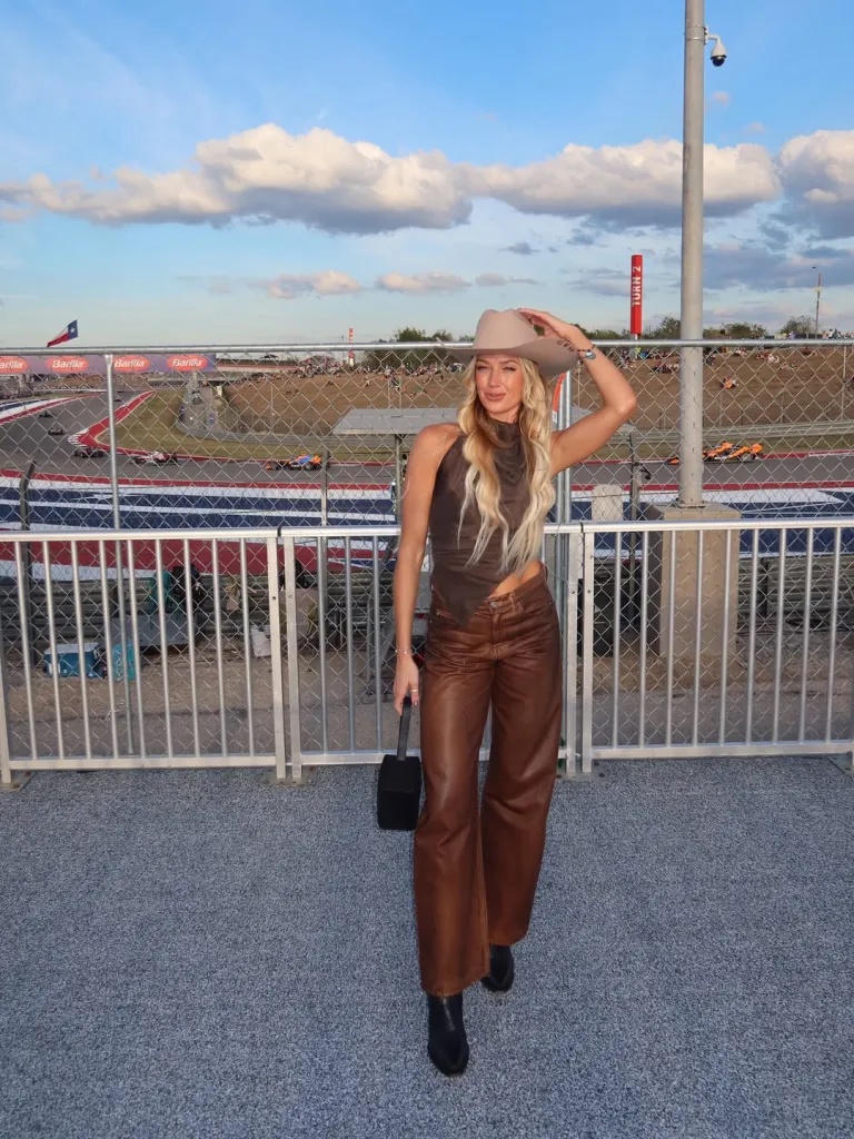 Sophie Cunningham wearing a cowgirl hat and boots on a Texas trip.