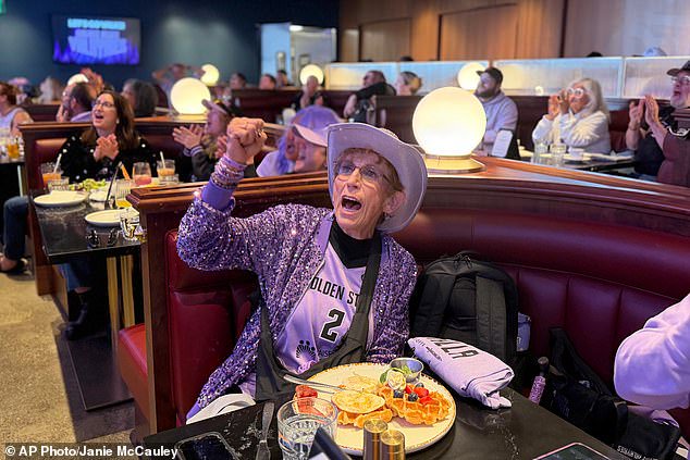 Valkyries fan Cynthia Cheak cheers over breakfast at Splash restaurant at Chase Center's Thrive City plaza, Thursday. The watch part was well attended despite the early tip-off