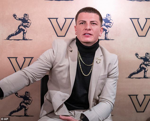 Pavia, last year's Heisman runner-up, signed with the Baltimore Ravens after going undrafted