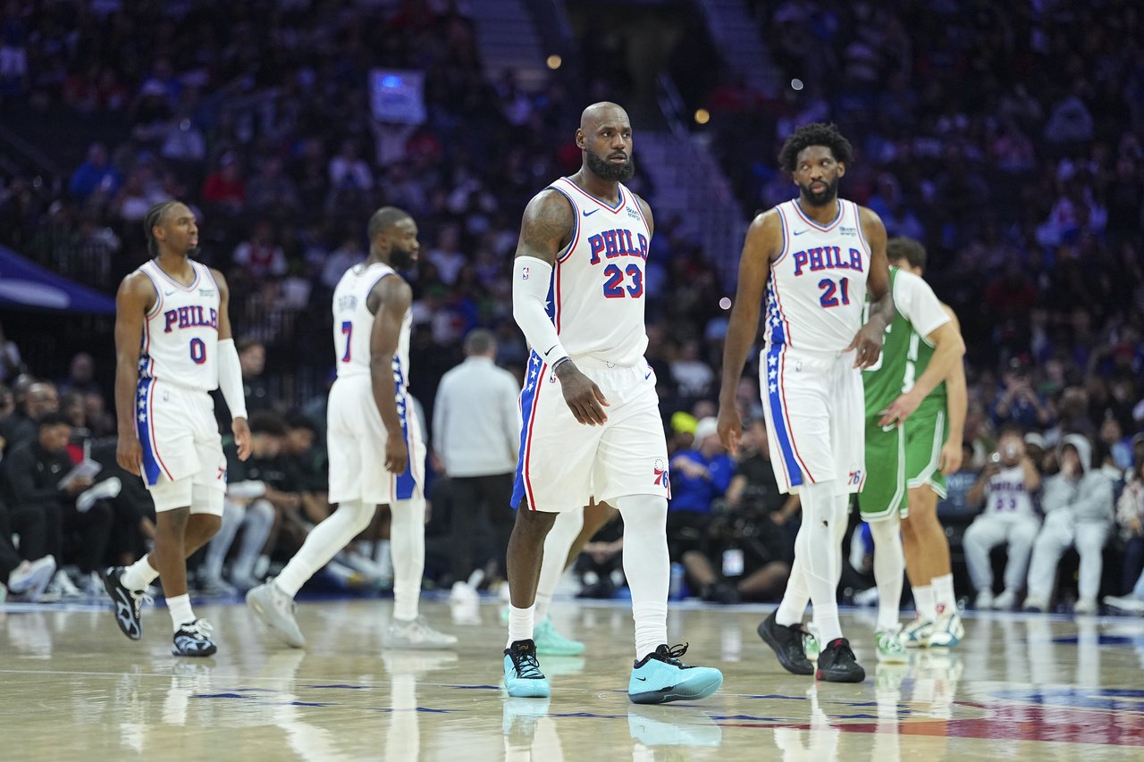PHILADELPHIA, PENNSYLVANIA - OCTOBER 16: LeBron James #23, Joel Embiid #21, Jaylen Brown #7, and Tyrese Maxey #0 of the Philadelphia 76ers look on against the Boston Celtics during the preseason game at Xfinity Mobile Arena on October 16, 2026 in Philadelphia, Pennsylvania. NOTE TO USER: User expressly acknowledges and agrees that, by downloading and or using this photograph, User is consenting to the terms and conditions of the Getty Images License Agreement. (Photo by Mitchell Leff/Getty Images)